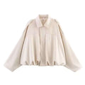 Veste courte pour femmes en coupe oversize avec ourlet ballon et épaulettes