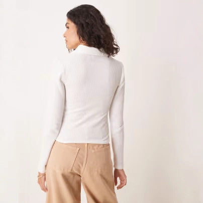 Polo à manches longues côtelé pour femmes avec patte de boutonnage décorative