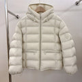 Veste thermo matelassée courte pour femmes avec capuche, poches zippées et bords élastiques Echo Archiv