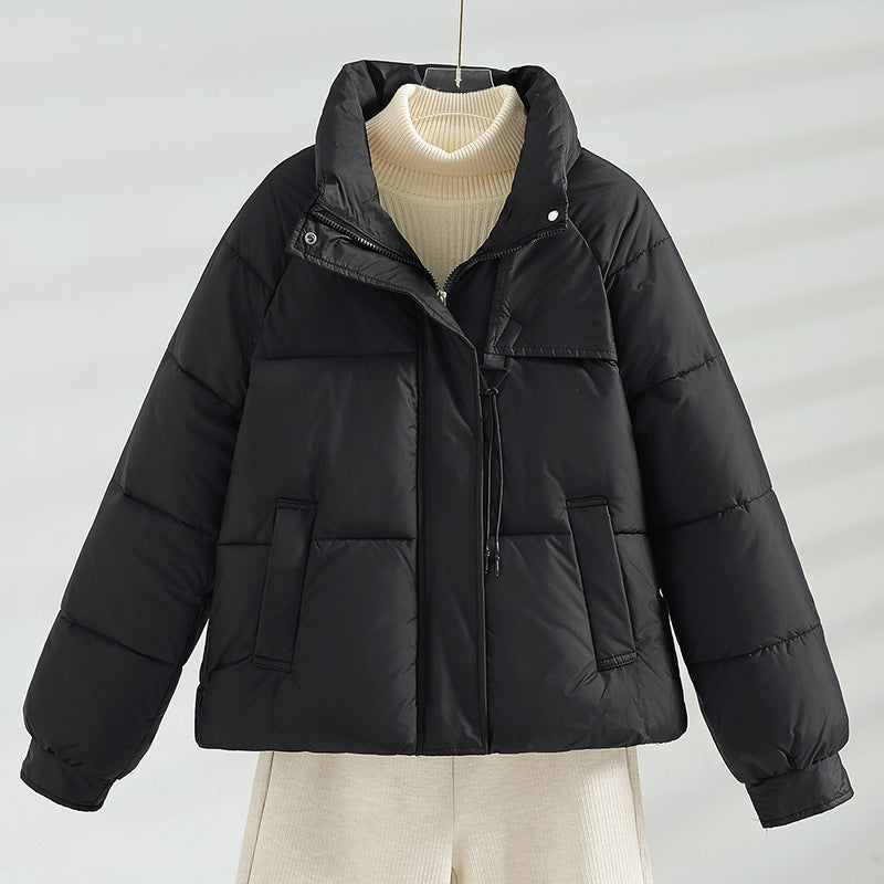 Veste courte matelassée Boxy pour femmes avec col montant, cordon de serrage à la poitrine et poches à rabat obliques Echo Archiv