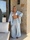 Ensemble de plage à broderie ajourée pour femmes avec chemise oversize, poche poitrine et pantalon palazzo ample R&B