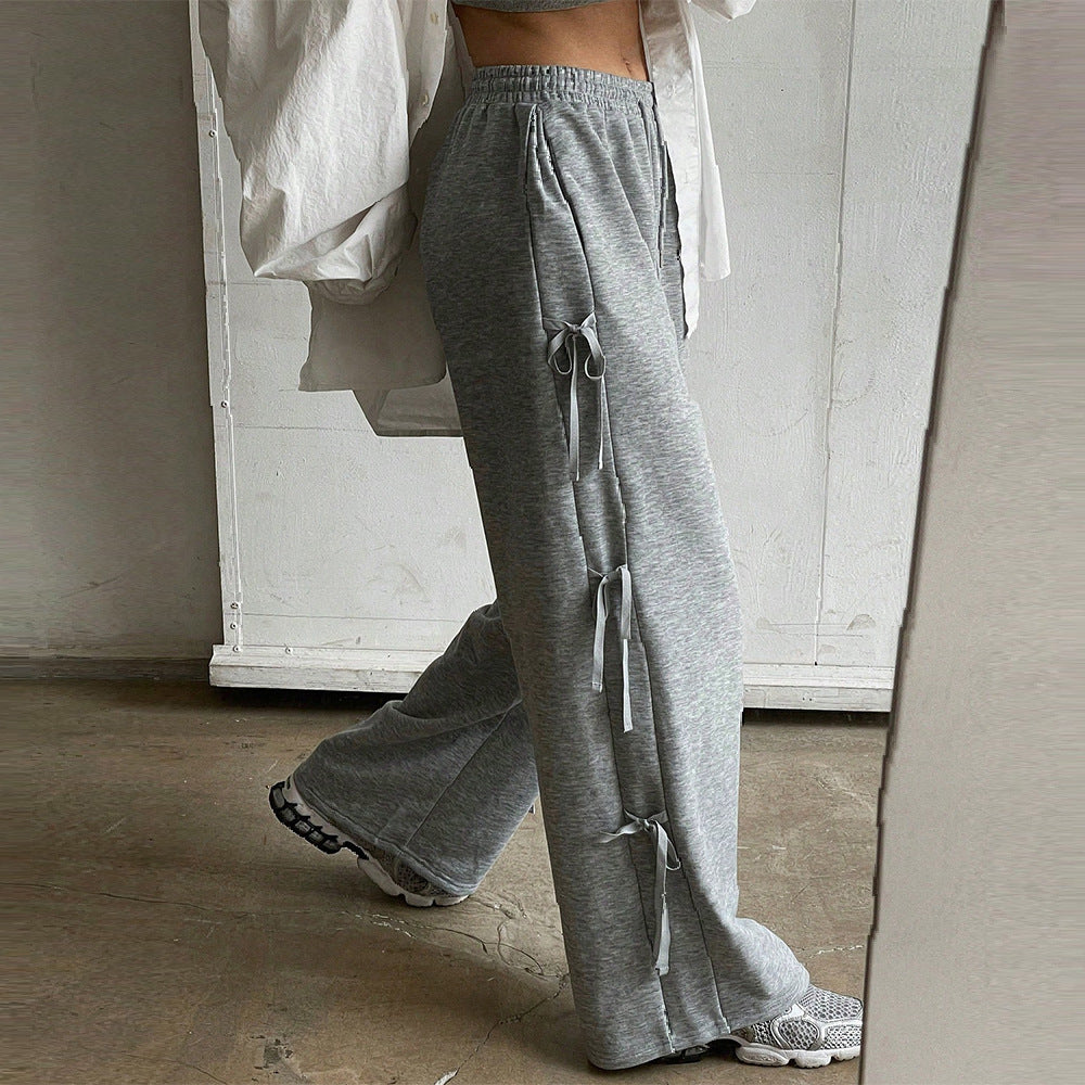 Pantalon lounge large pour femmes avec taille élastique, cordon de serrage et nœuds décoratifs sur les côtés