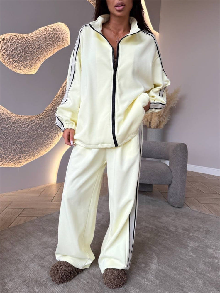 Ensemble d'entraînement oversize doux pour femmes avec veste zippée et pantalon de jogging taille haute large avec bandes contrastées Echo Archiv