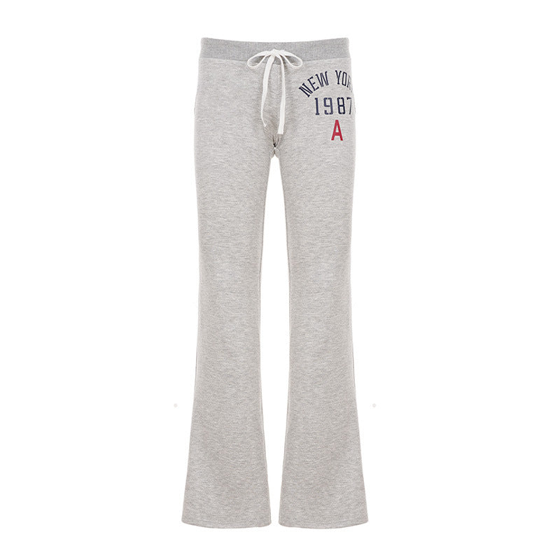 Pantalon de jogging évasé pour femmes avec cordon de serrage, poches latérales et imprimé Love frappant Echo Archiv