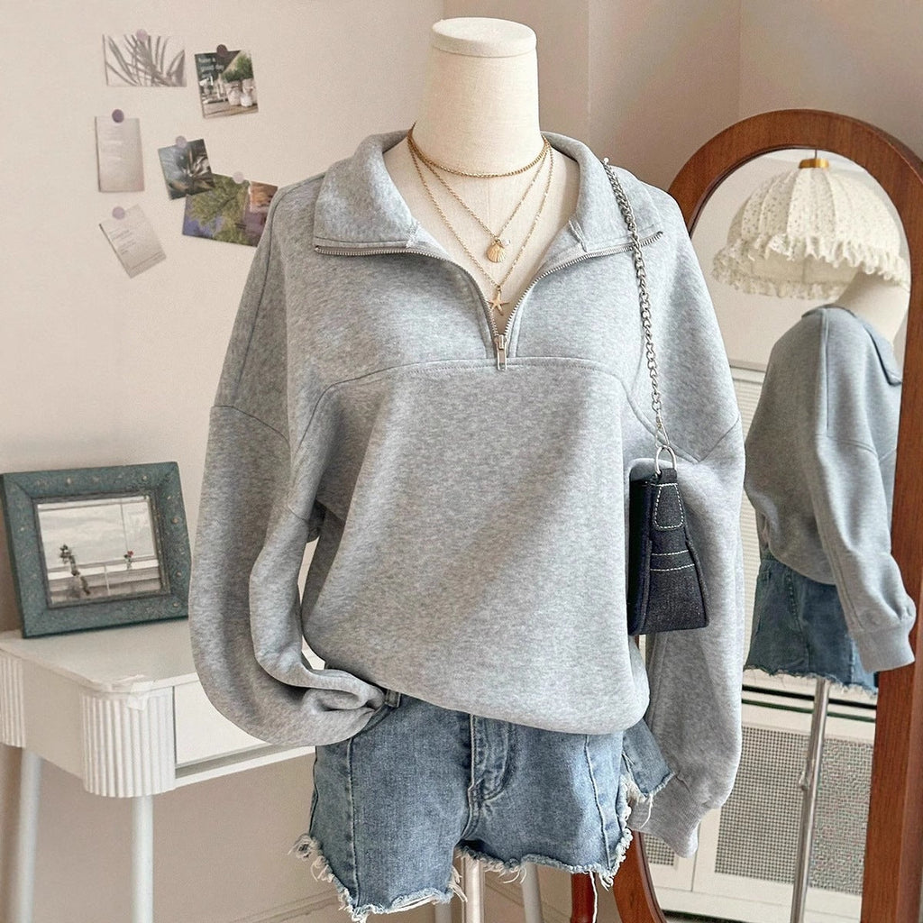 Sweatshirt oversize pour femmes avec demi-fermeture éclair, col montant et manches ballon Echo Archiv