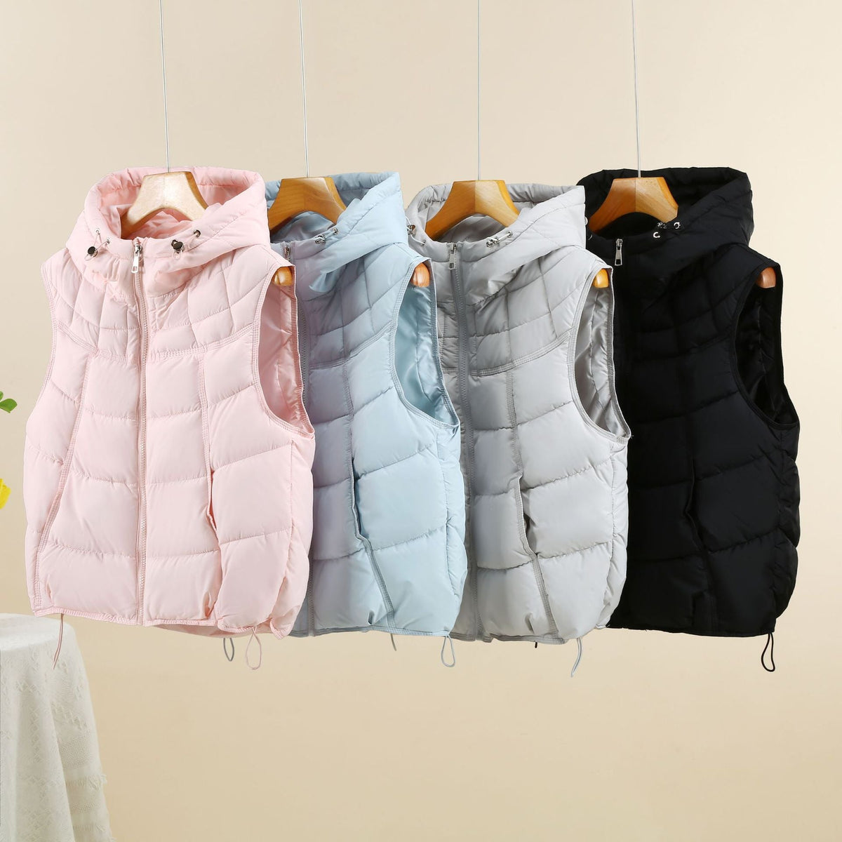 Gilet thermique léger matelassé pour femmes avec capuche ergonomique et ourlet ajustable Echo Archiv