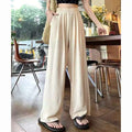 Pantalon palazzo large en look lin pour femmes avec taille haute, ceinture élastique et poches