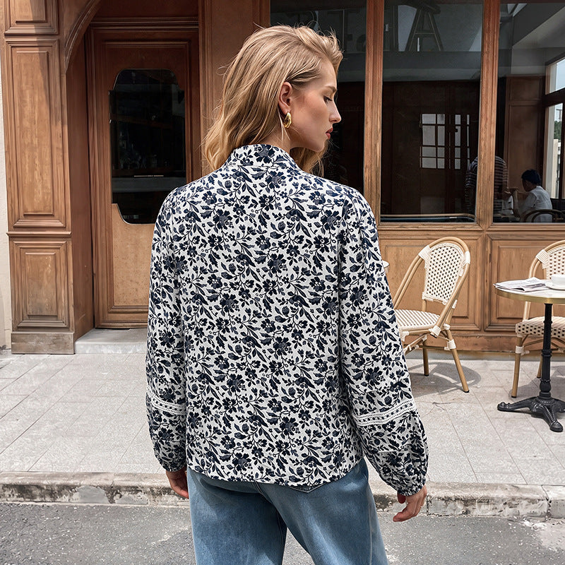 Tunique-blouse fleurie pour femmes avec nœud à nouer, bas volanté et détails en dentelle Echoarchiv
