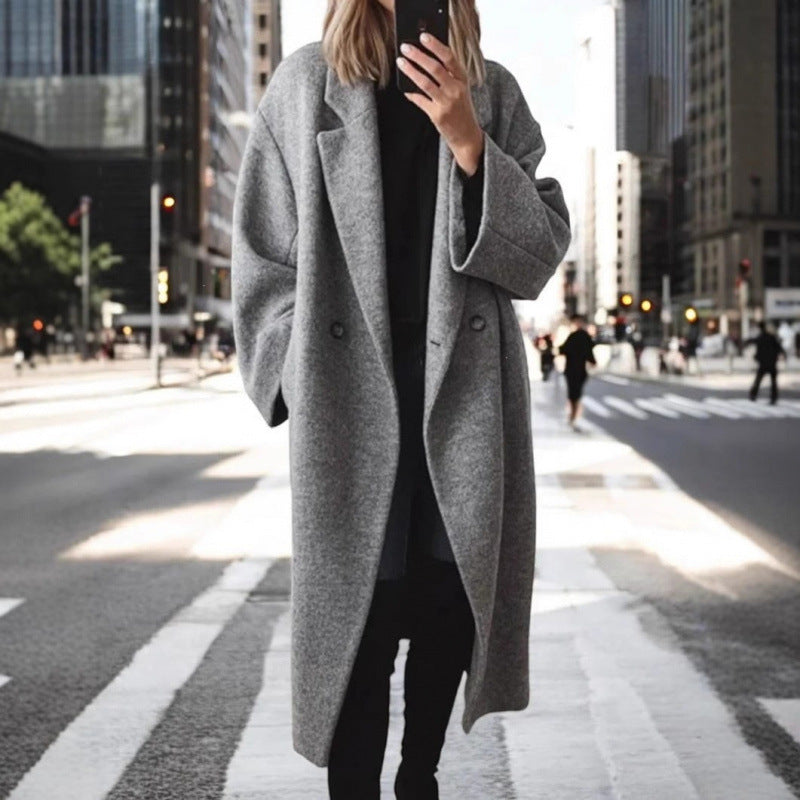 Manteau oversized en mélange de laine pour femmes avec double rangée de boutons, grand col à revers et poches passepoilées Echoarchiv