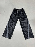 Pantalons de sport en simili cuir large pour femmes avec taille élastique, cordon de serrage et bandes latérales Echo Archiv