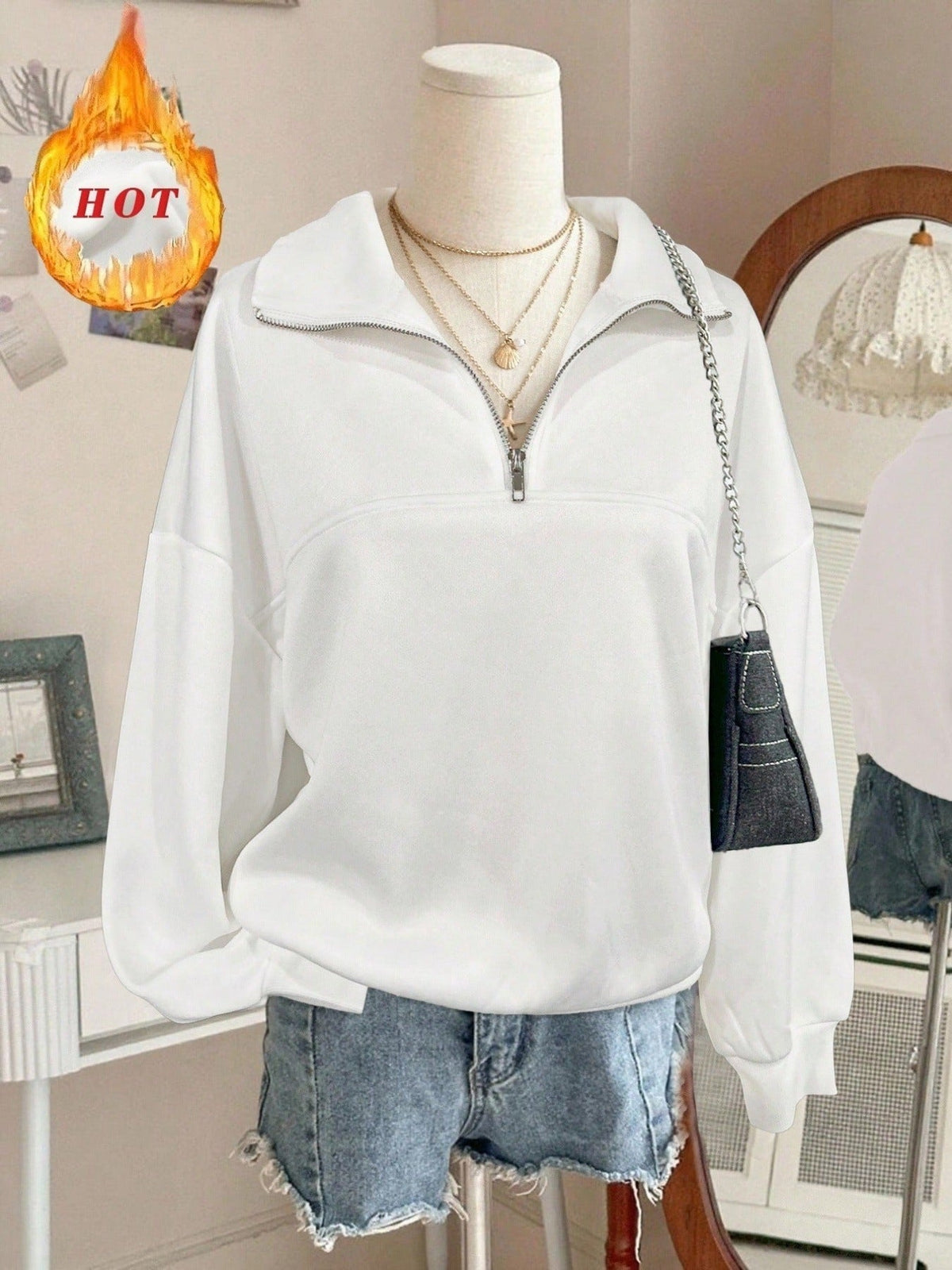 Sweatshirt oversize pour femmes avec demi-fermeture éclair, col montant et manches ballon Echo Archiv