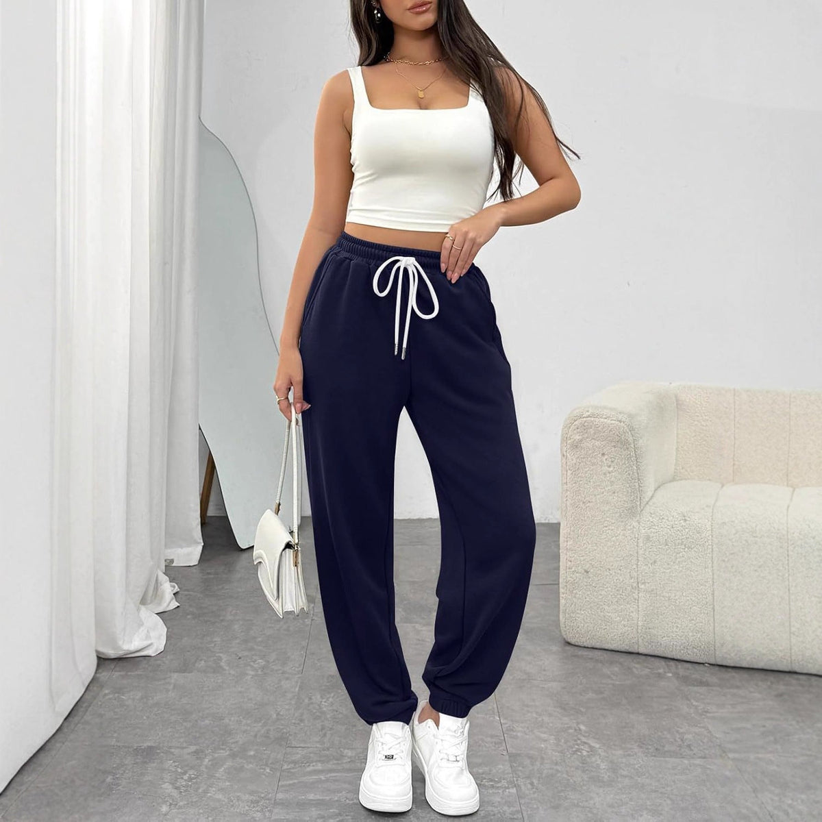 Pantalon de jogging taille haute pour femmes avec cordon de serrage, poignets élastiques et poches latérales Echoarchiv