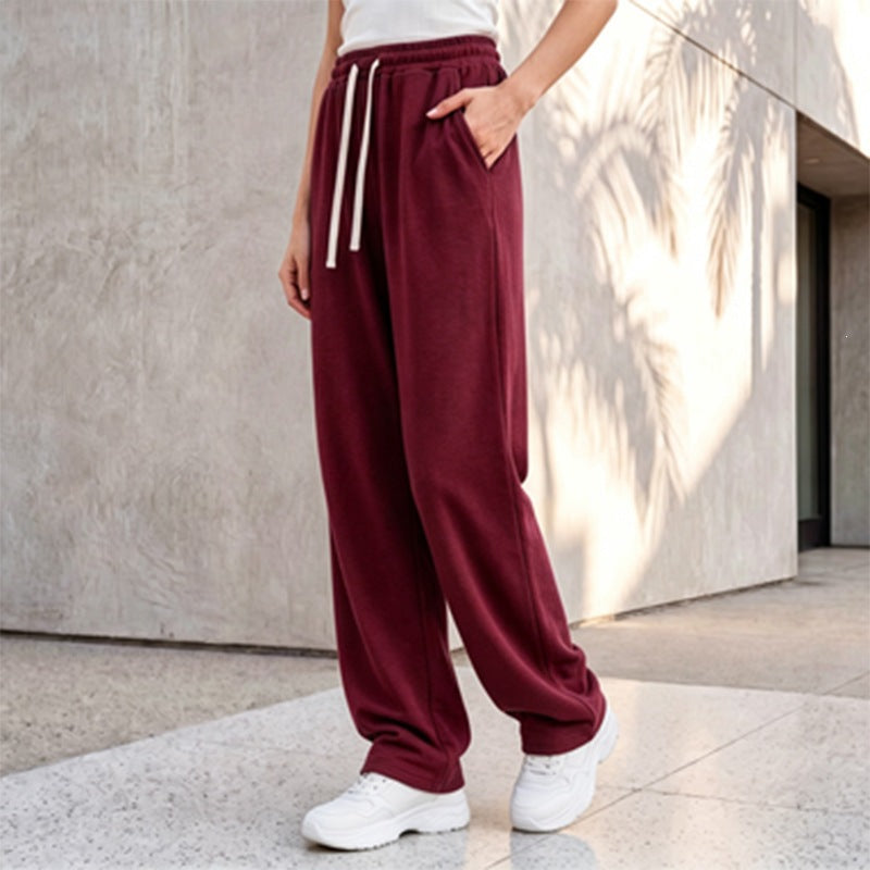 Pantalon palazzo lounge pour femmes avec taille confortable, cordon de serrage, poches latérales et couture décorative Echo Archiv