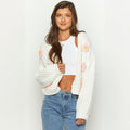 Cardigan court en grosse maille pour femmes avec appliqués floraux 3D et manches ballon Echoarchiv