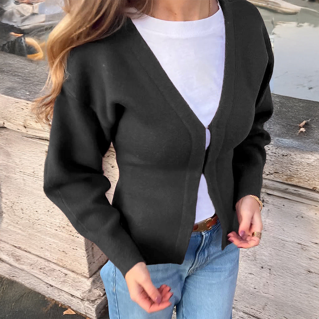 Veste en tricot cintrée pour femmes avec décolleté en V, manches bouffantes et fentes latérales Echo Archiv