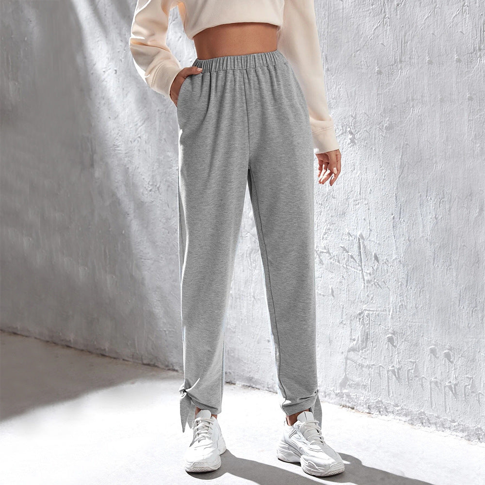 Pantalon de jogging décontracté pour femmes avec taille élastique haute, poches latérales et lien à la cheville