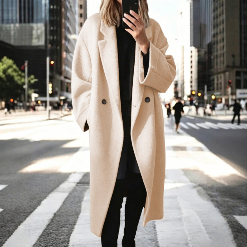 Manteau oversized en mélange de laine pour femmes avec double rangée de boutons, grand col à revers et poches passepoilées Echoarchiv