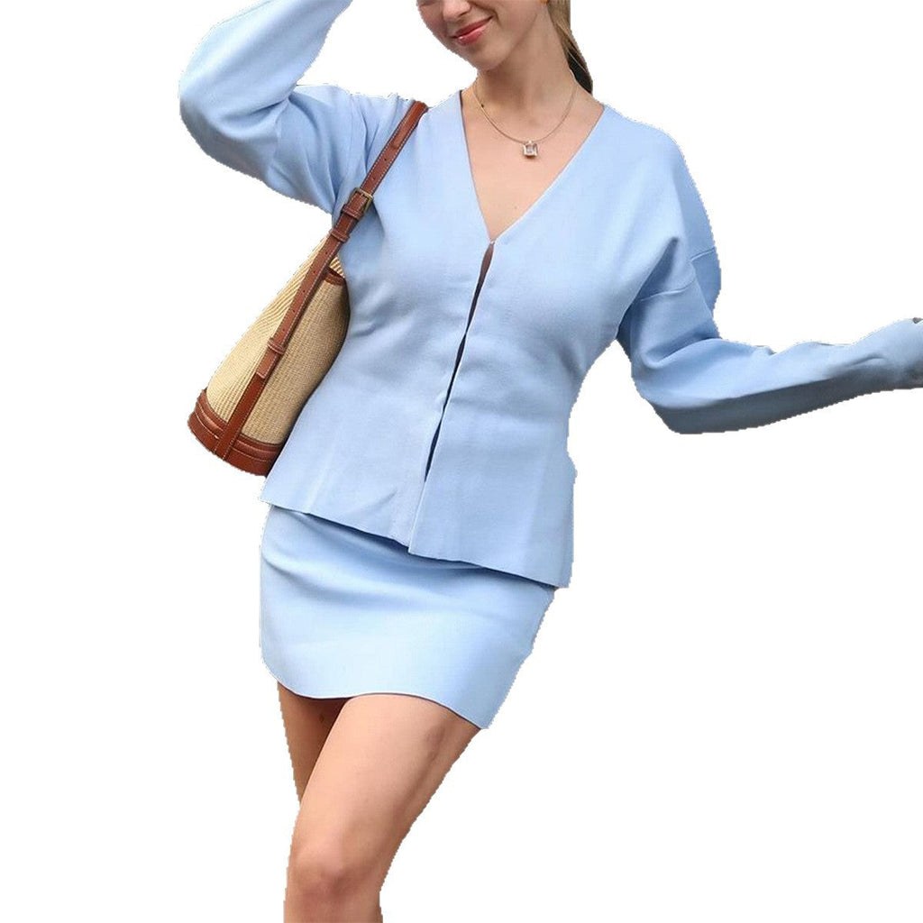 Veste en tricot cintrée pour femmes avec décolleté en V, manches bouffantes et fentes latérales Echo Archiv