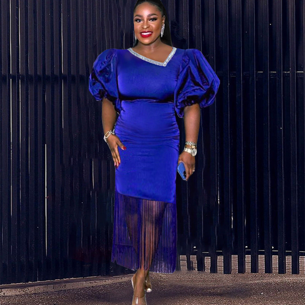 Robe de soirée glamour pour femmes avec des manches bouffantes volumineuses et un ourlet à franges R&B