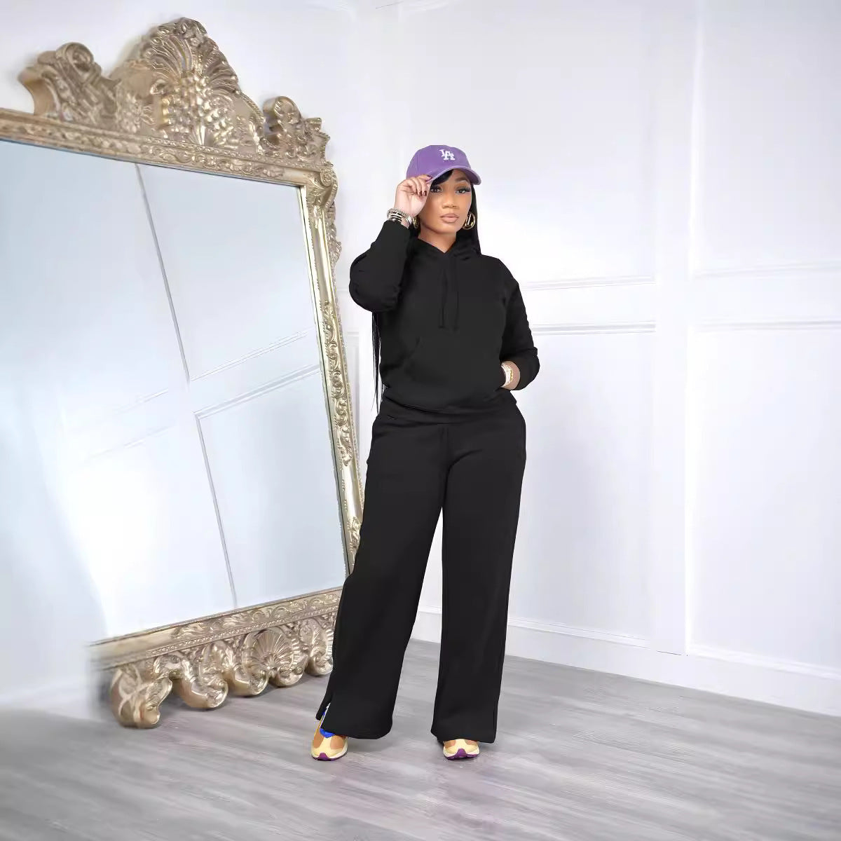 Ensemble de détente pour femmes avec pantalon palazzo taille haute, sweat à capuche avec poche kangourou et fente latérale Echo Archiv