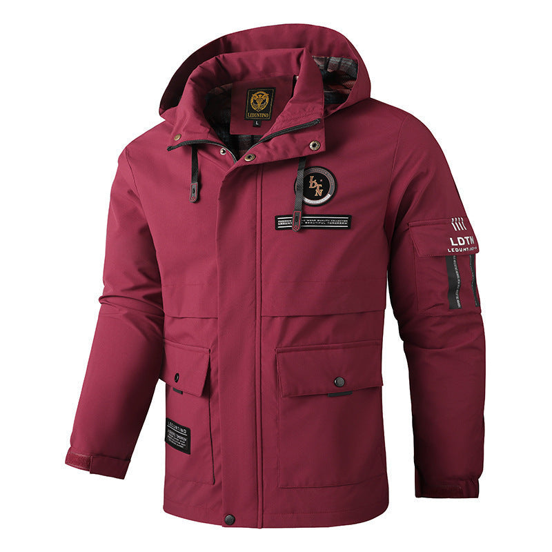 Parka Softshell urbaine pour hommes avec capuche, fermeture éclair à double sens dissimulée et poche sur le bras Echo Archiv