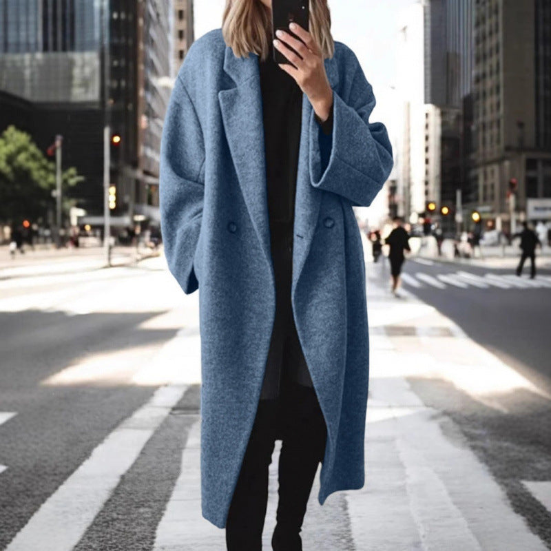 Manteau oversized en mélange de laine pour femmes avec double rangée de boutons, grand col à revers et poches passepoilées Echoarchiv