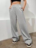 Pantalon de lounge large pour femmes en French Terry avec taille confortable, poches latérales et jambe fluide Echo Archiv