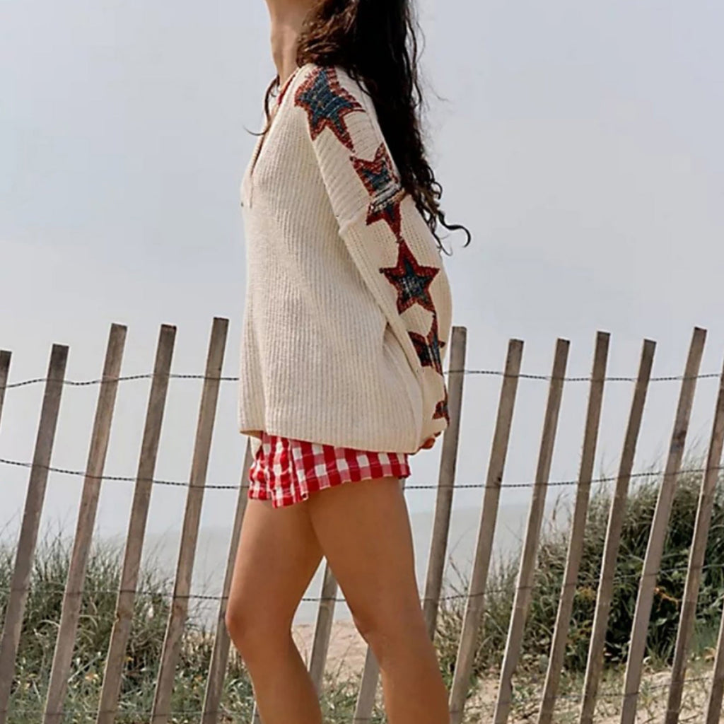 Pull en tricot oversize pour femmes avec décolleté en V et motifs d'étoiles Echoarchiv