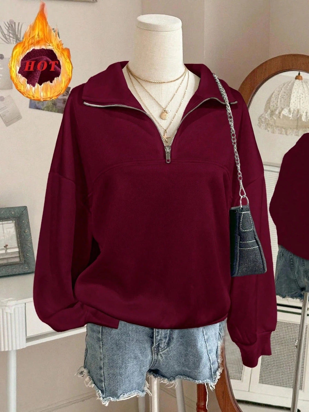 Sweatshirt oversize pour femmes avec demi-fermeture éclair, col montant et manches ballon Echo Archiv