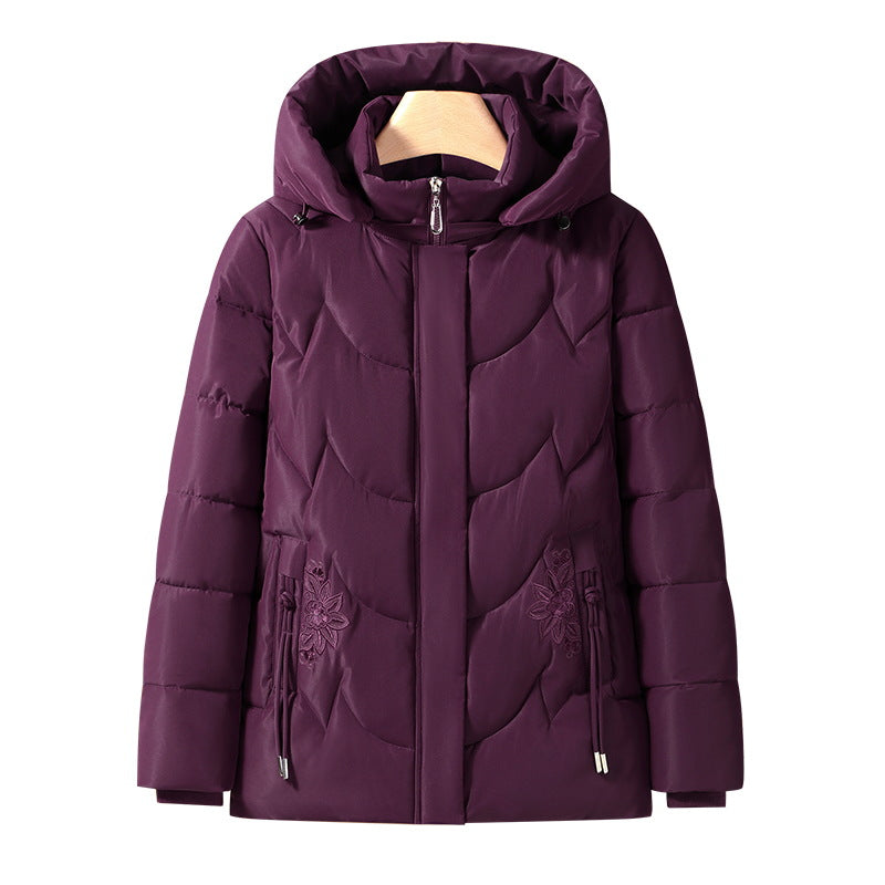Veste thermique outdoor matelassée pour femmes avec capuche ergonomique et broderie florale sur les poches Echo Archiv