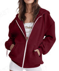 Veste à capuche zippée oversize pour femmes avec fermeture éclair contrastante, capuche double épaisseur et poche kangourou Echo Archiv