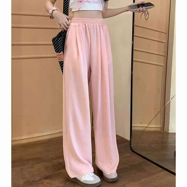 Pantalon palazzo large en look lin pour femmes avec taille haute, ceinture élastique et poches