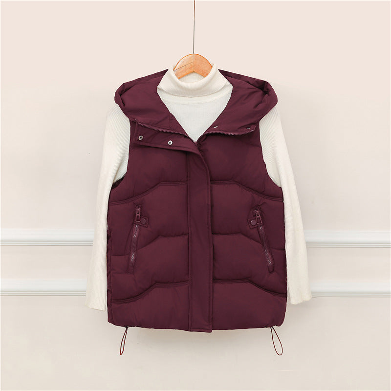 Gilet à capuche matelassé pour femmes avec rabat de fermeture éclair caché, cordon ajustable à la taille et poches zippées fonctionnelles Echo Archiv