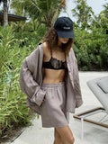Ensemble pour femmes avec boutons et manches longues