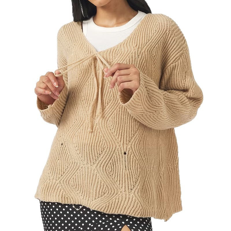 Pull-over en maille oversize pour femmes avec décolleté en V, cordon de serrage et structure en losanges