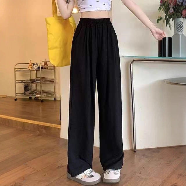 Pantalon palazzo large en look lin pour femmes avec taille haute, ceinture élastique et poches