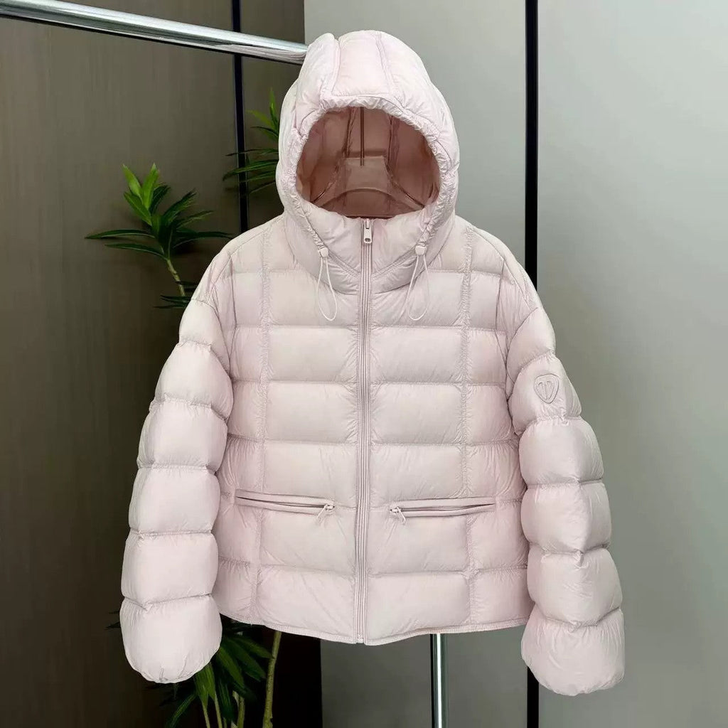 Veste thermo matelassée courte pour femmes avec capuche, poches zippées et bords élastiques Echo Archiv