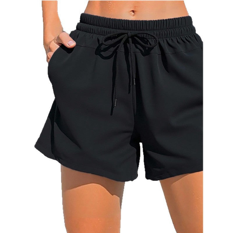 Shorts de sport pour femmes avec taille élastique et poches latérales pratiques R&B