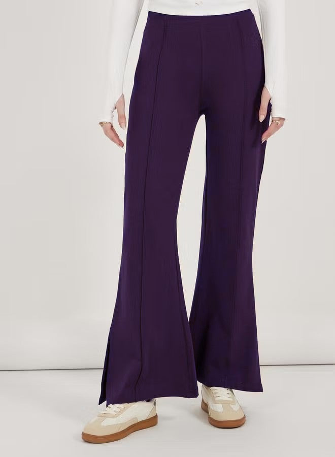 Pantalon évasé pour femmes à taille haute, avec pli permanent et fente latérale