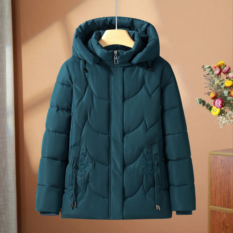 Veste thermique outdoor matelassée pour femmes avec capuche ergonomique et broderie florale sur les poches Echo Archiv