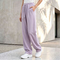Pantalon palazzo lounge pour femmes avec taille confortable, cordon de serrage, poches latérales et couture décorative Echo Archiv
