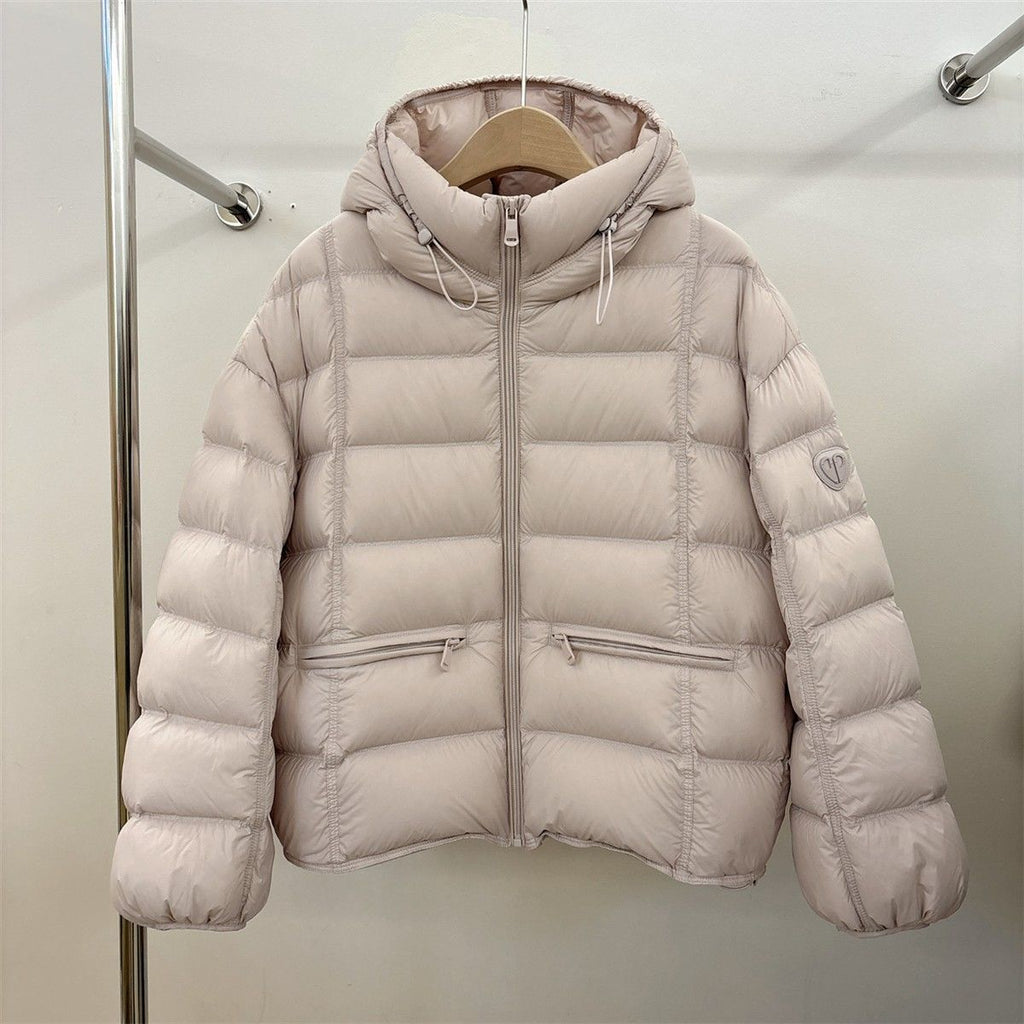 Veste thermo matelassée courte pour femmes avec capuche, poches zippées et bords élastiques Echo Archiv
