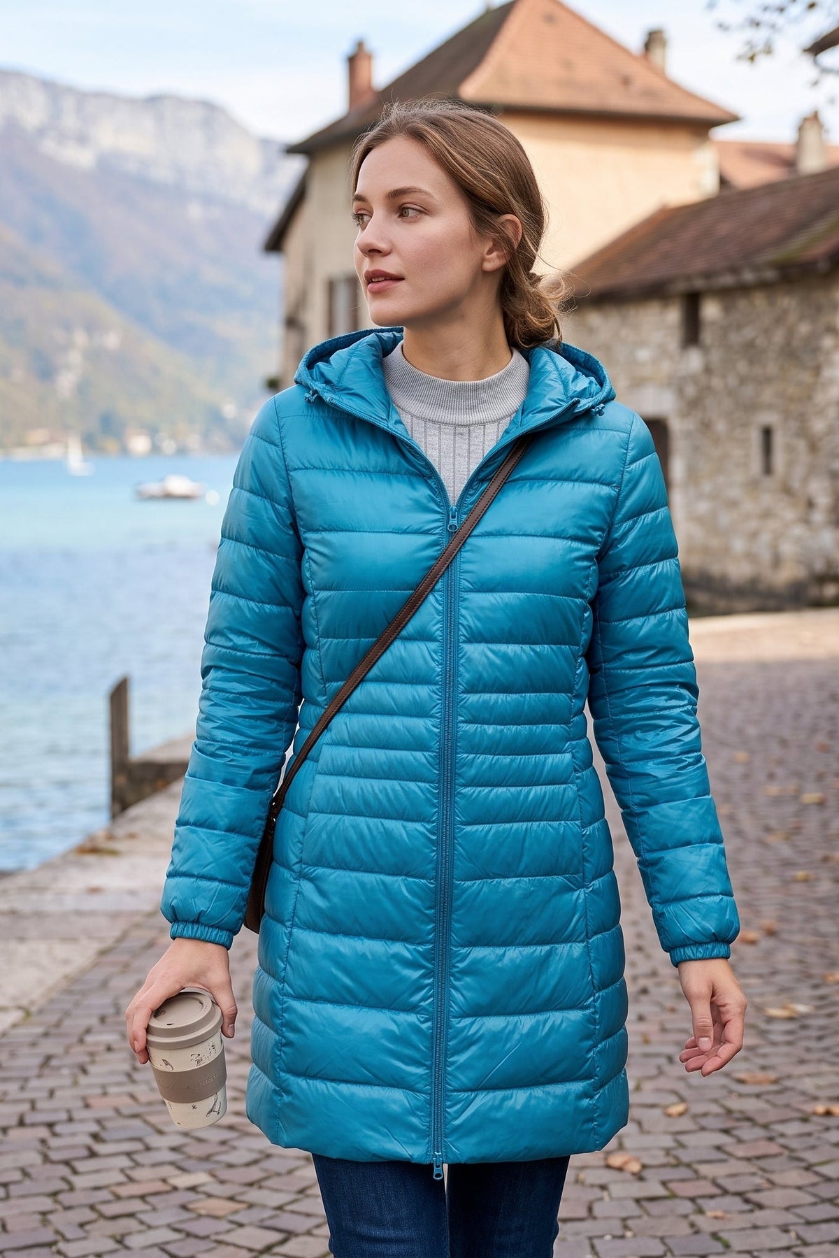 Manteau long matelassé à capuche et fermeture éclair