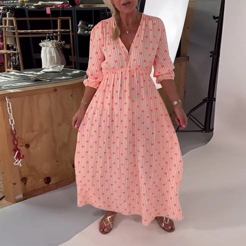 Robe élégante à imprimé cœur et décolleté en V