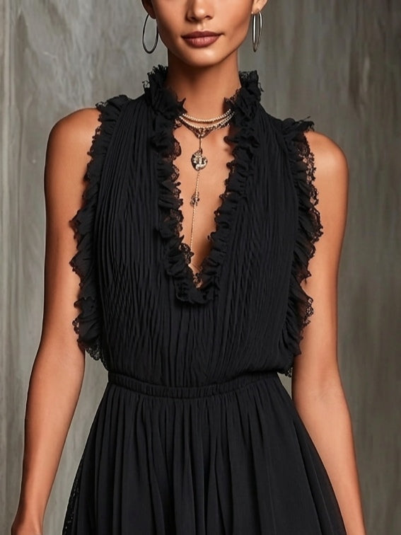 Noiréa | Combinaison en chiffon noir avec plissé et volants