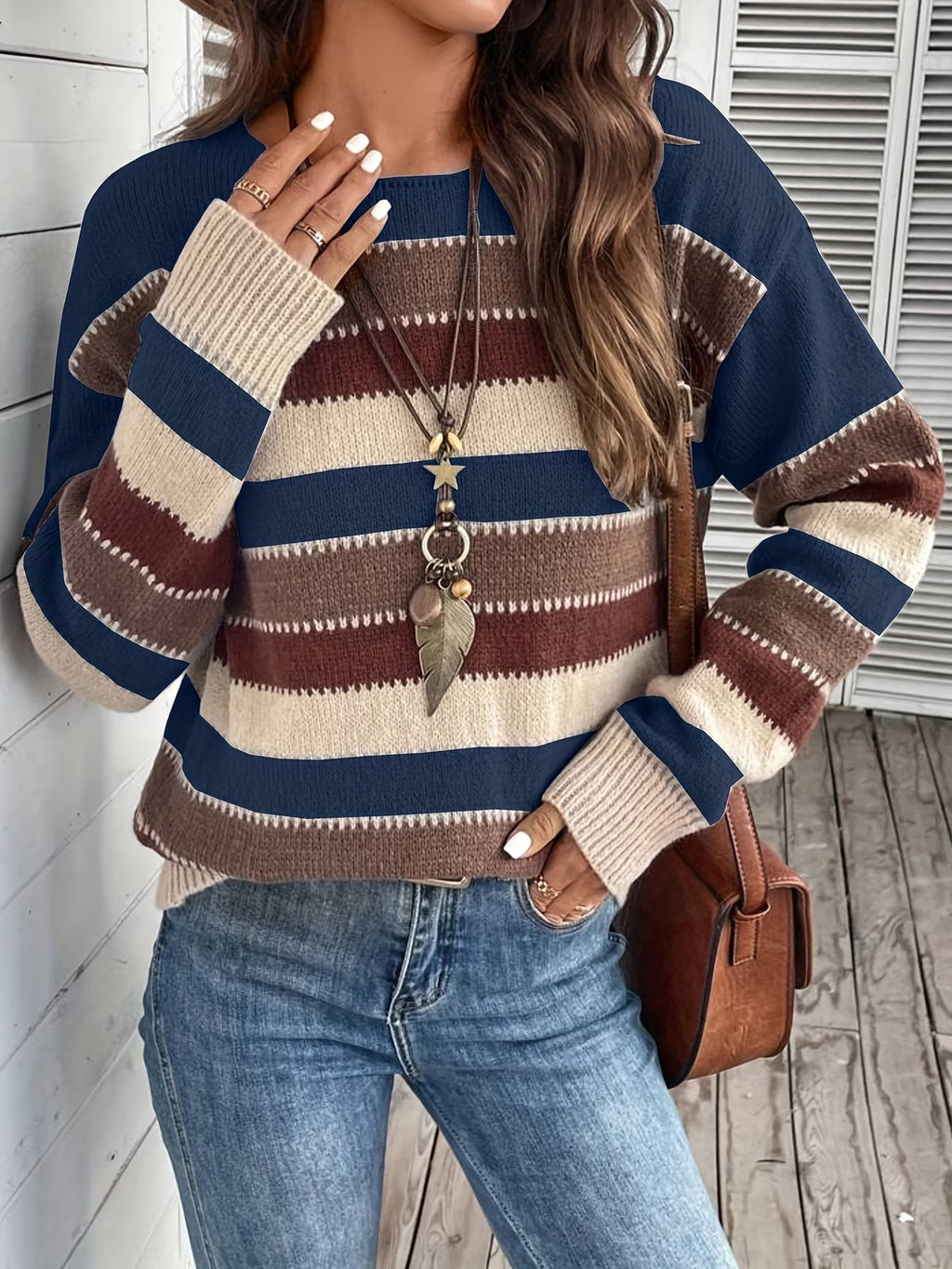 Pull femme rayé en maille à col rond