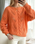 Pull en tricot uni à encolure ronde et épaules tombantes