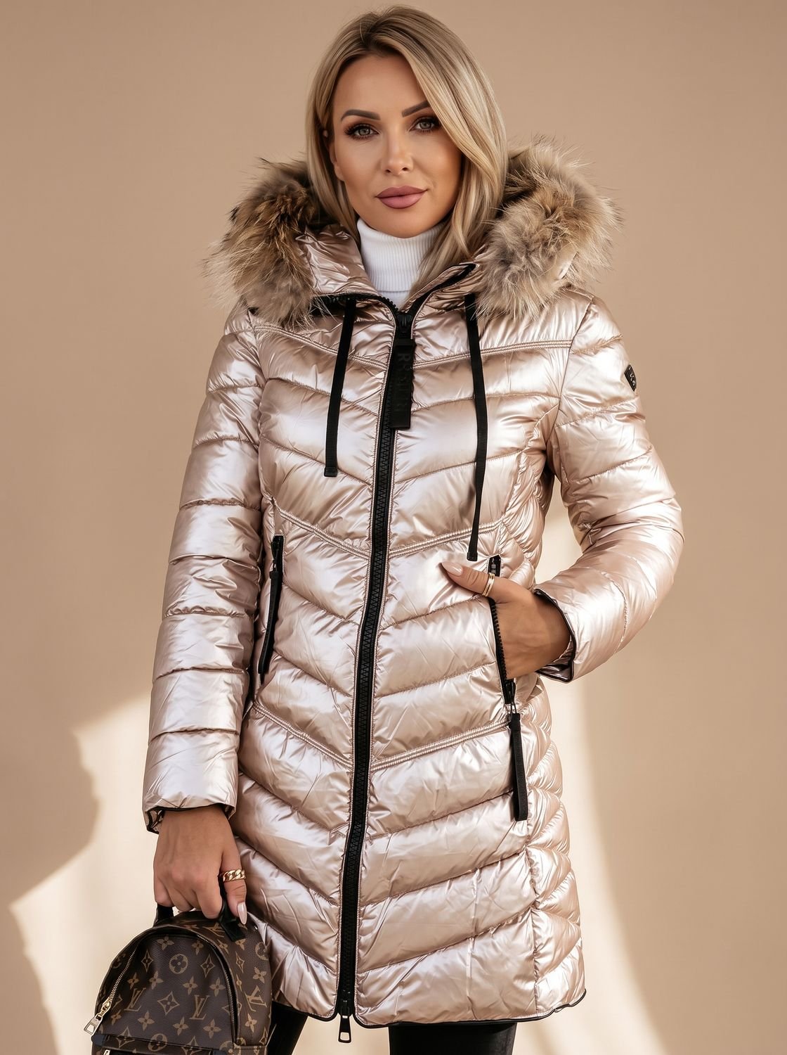 Marlene | Veste matelassée brillante pour femmes avec capuche en fausse fourrure et poches zippées