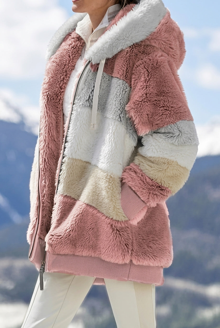 Veste pour femmes avec capuche en fausse fourrure au design colorblock
