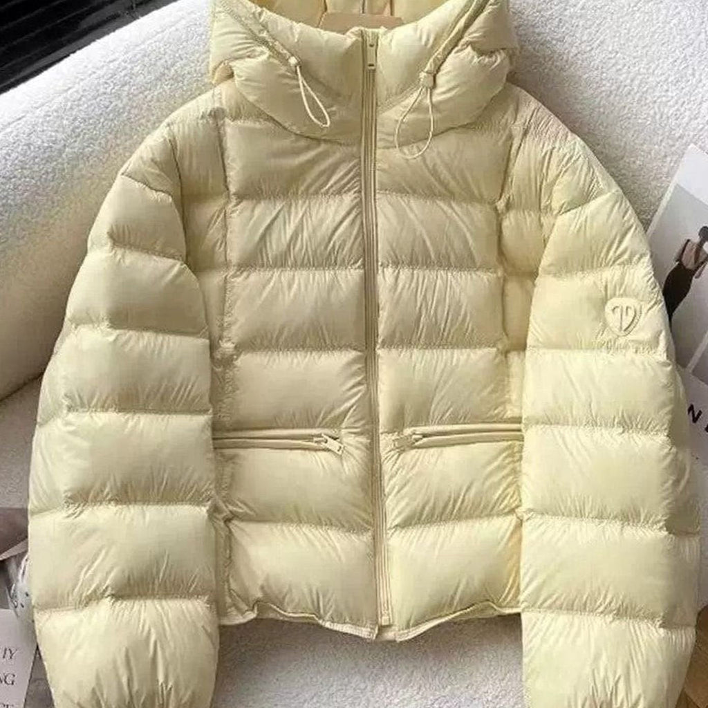 Emilia | Veste courte thermique pour femmes avec capuche et poches zippées